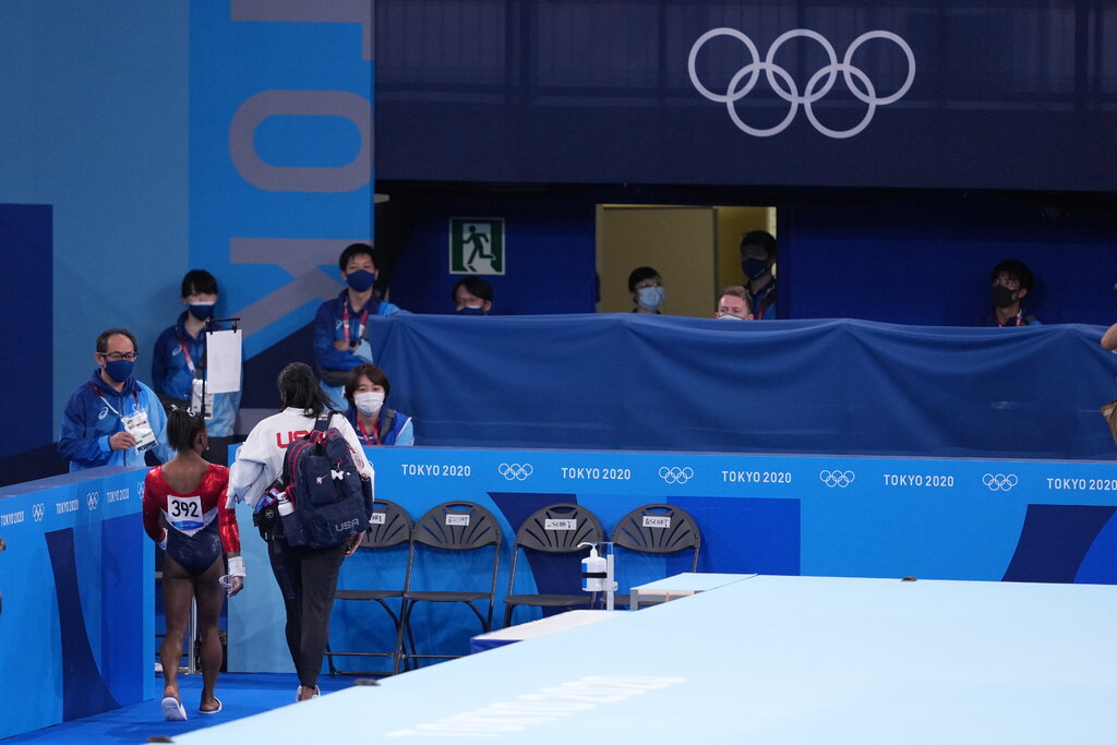 Simone Biles and her trainer