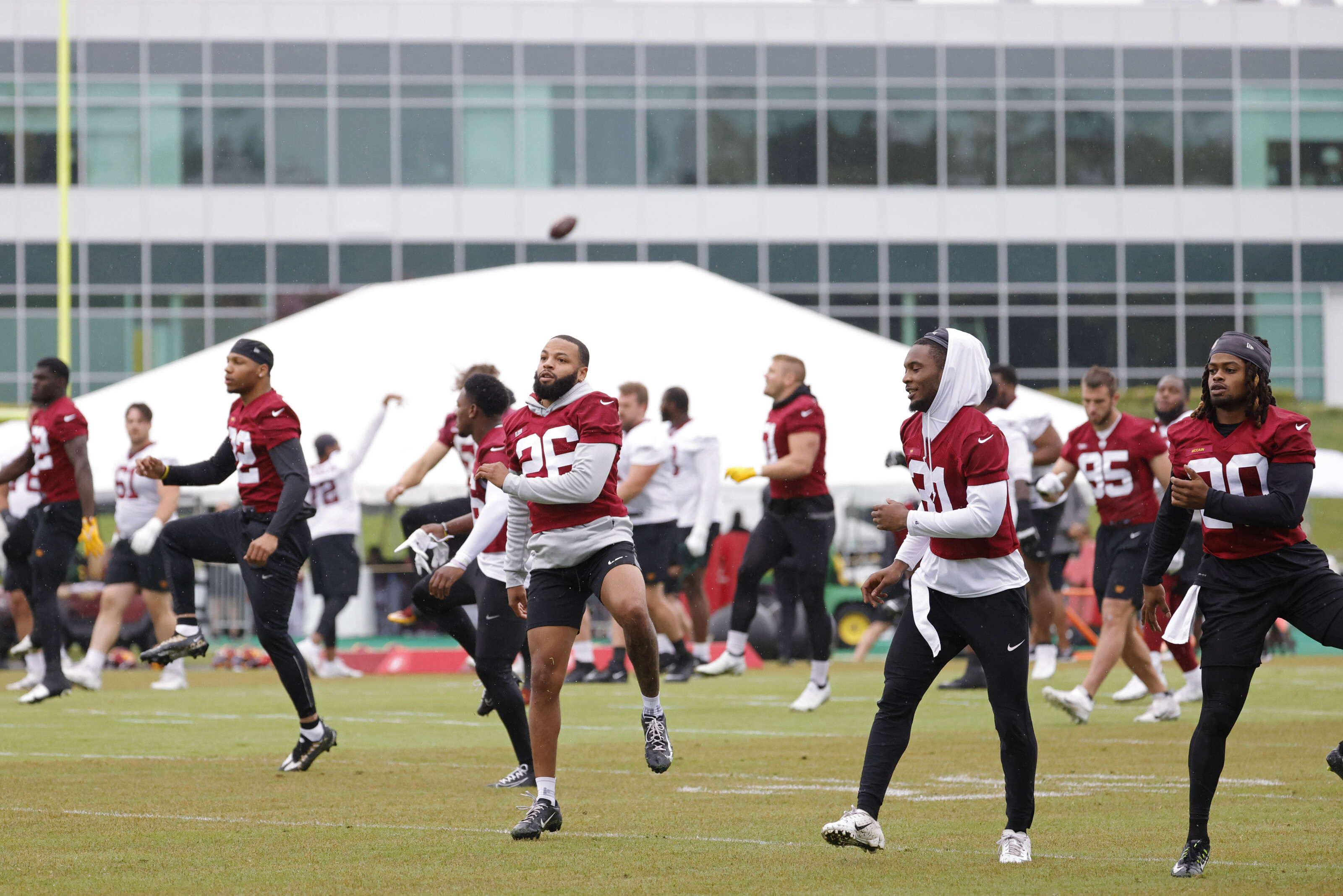 Washington Commanders warming up at OTAs