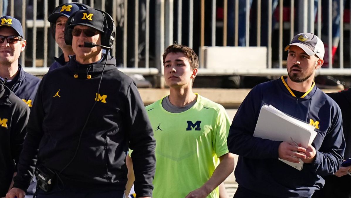 Former Michigan Football Head Coach Jim Harbaugh (left) and staffer Connor Stalions (right).