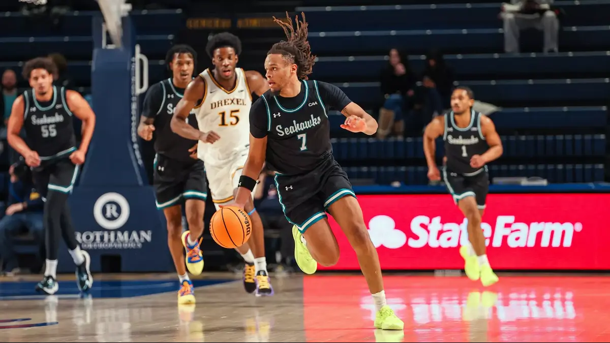 UNCW's Greedy Williams carries the ball up the floor in the Seahawks' 81-79 double overtime win over Drexel on Saturday.